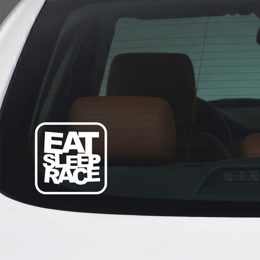 White Eat Sleep Race sticker applied to a car window.