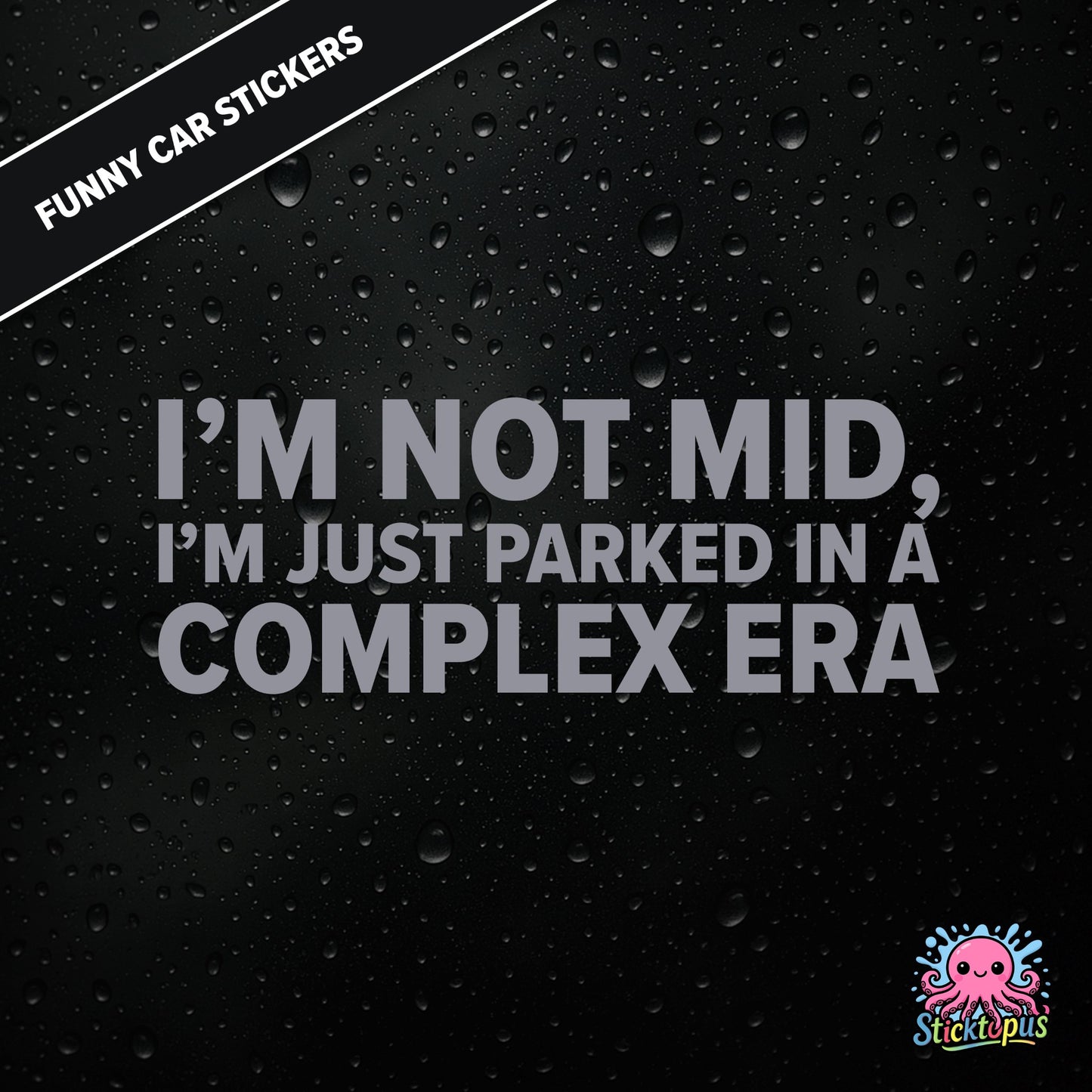 I’m Not Mid, I’m Just Parked In A Complex Era — absurd mid-era sticker in silver text, surreal generational nonsense.