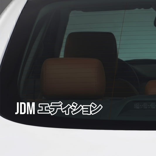 White JDM import kanji sticker applied to a car window.