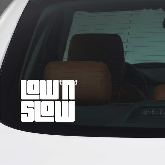 White Low N Slow vinyl sticker applied to a car window.
