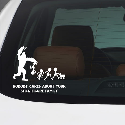 White Nobody Cares about your stick figure family Bigfoot vinyl sticker applied to a car window.