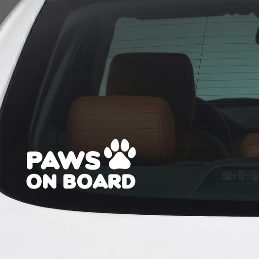 White Paws on Board sticker applied to a car window.