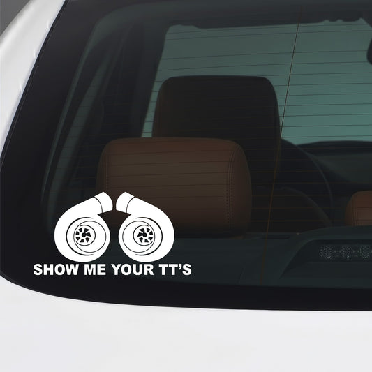 White Show Me Your TTs sticker applied to a car window.