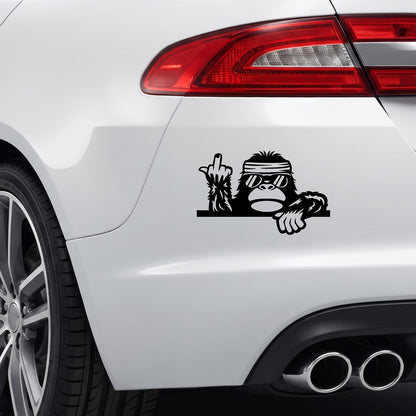 Black Cool Bigfoot Middle Finger sticker applied to a car rear bumper.