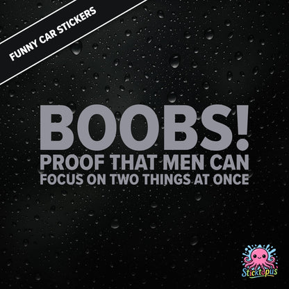 Boobs! PROOF THAT MEN CAN FOCUS ON TWO THINGS AT ONCE — bold silver text, cheeky multitasking joke sticker.