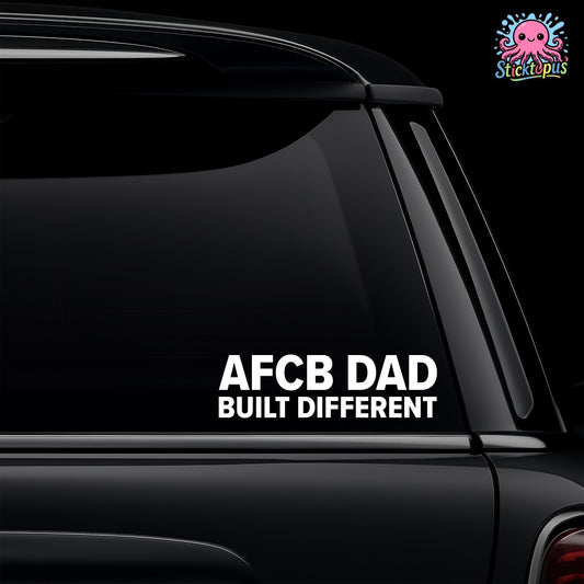 Car window with a decal reading 'AFCB DAD BUILT DIFFERENT' and Sticktopus logo.
