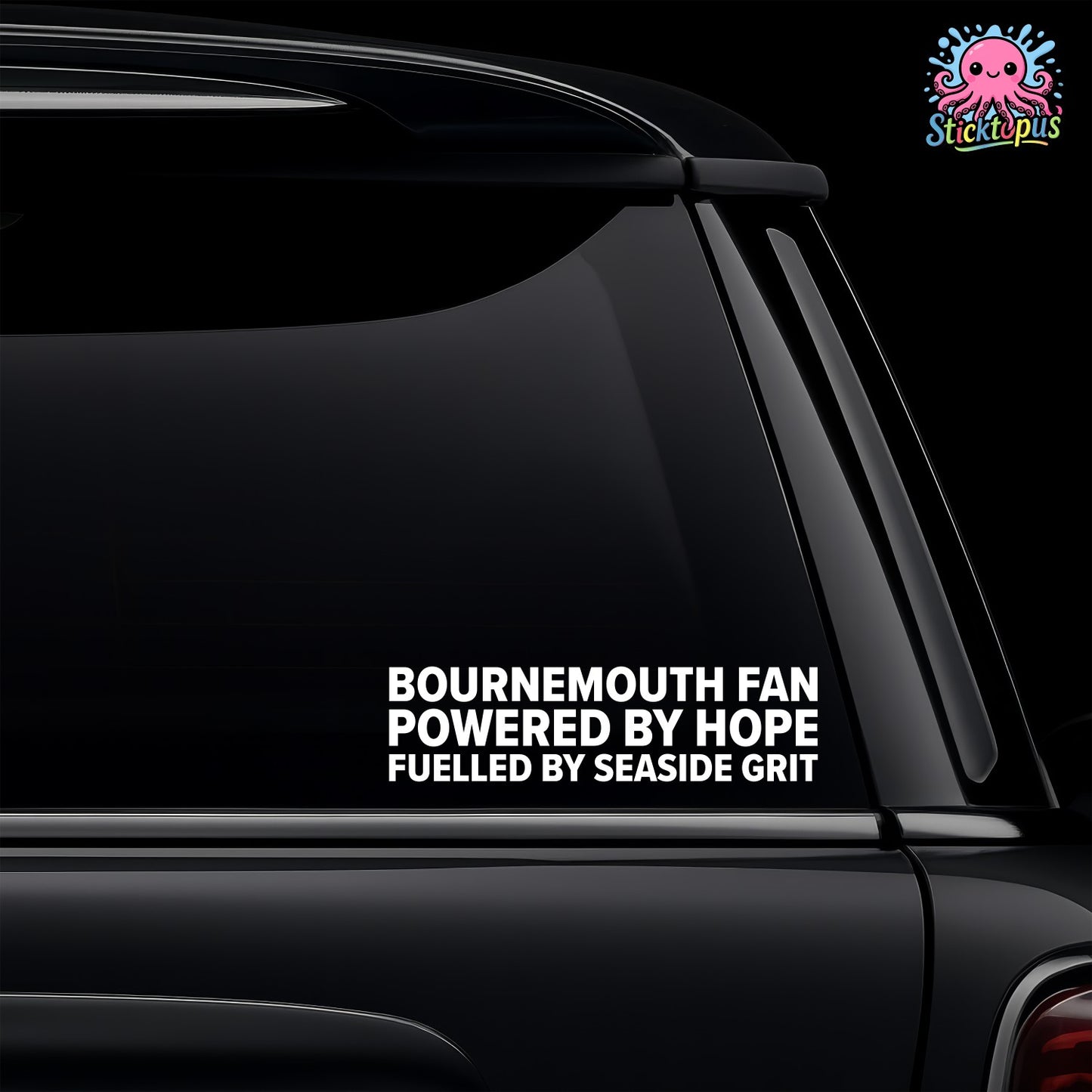 Car window with a decal reading 'Bournemouth Fan Powered by Hope Fuelled by Seaside Grit' on a black background.