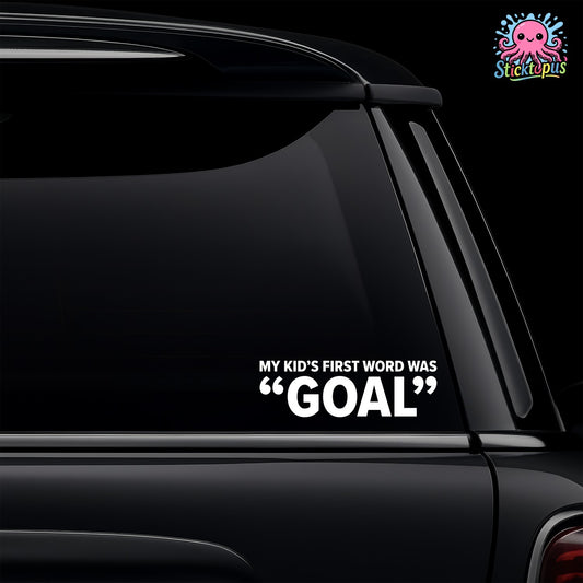 Car window with 'MY KID'S FIRST WORD WAS GOAL' decal and Sticktopus logo.