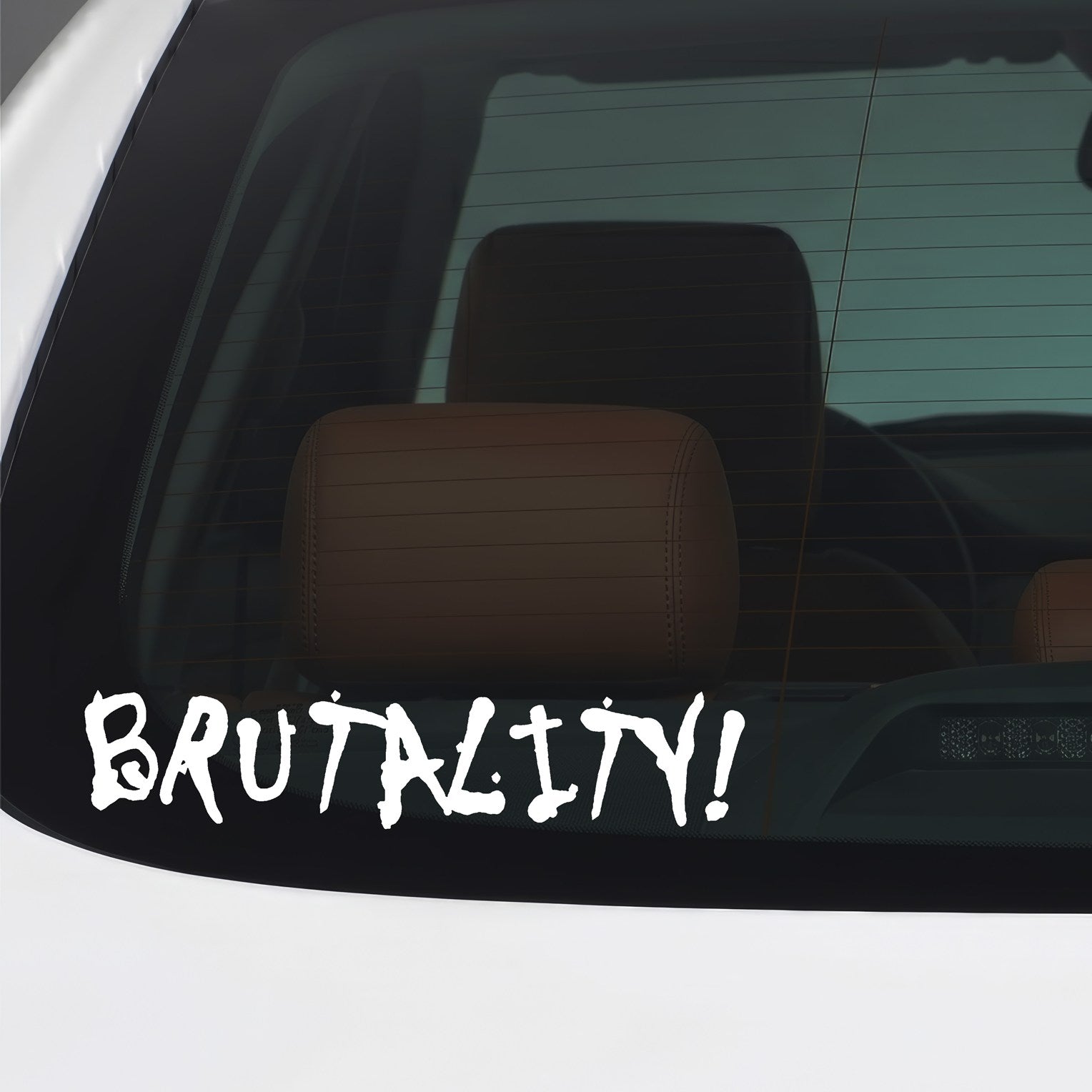 White Brutality sticker applied to a car window.