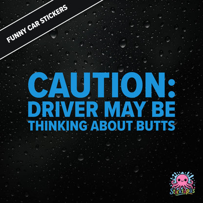 Caution: Driver May Be Thinking About Butts — cheeky caution sticker in blue text, surreal distraction warning.