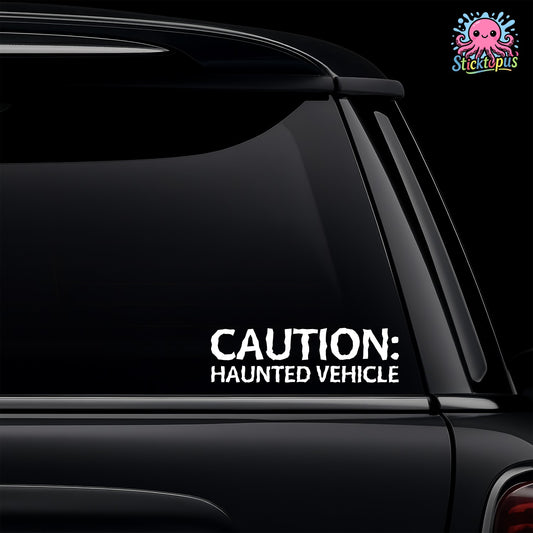 Black vehicle with 'CAUTION: HAUNTED VEHICLE' decal on a dark background
