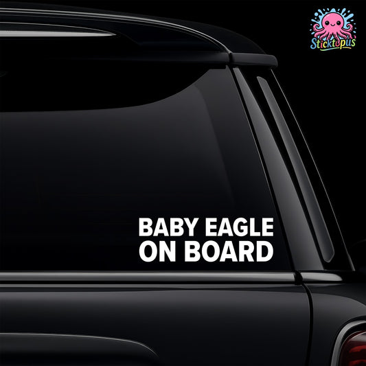 Car window with 'BABY EAGLE ON BOARD' decal and Sticktopus logo.