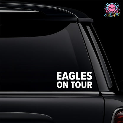 Car window with 'EAGLES ON TOUR' decal and Sticktopus logo.