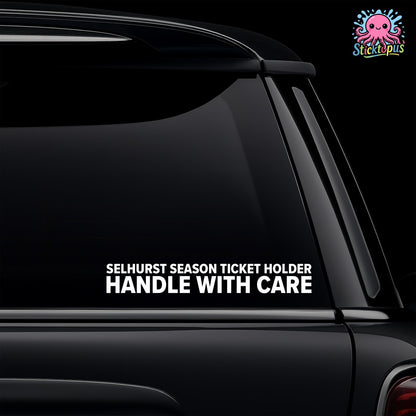 Car window with 'SELHURST SEASON TICKET HOLDER - HANDLE WITH CARE' sticker and Sticktopus logo.