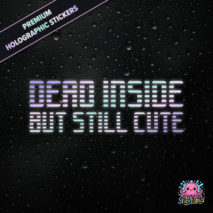 Premium holographic sticker with the phrase “DEAD INSIDE BUT STILL CUTE” in bold, pastel-shifting text on a black background with water droplets.