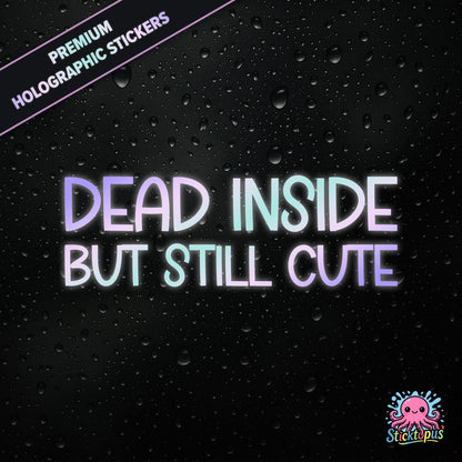 Premium holographic sticker with the phrase “DEAD INSIDE BUT STILL CUTE” in bold, pastel-shifting text on a black background with water droplets.