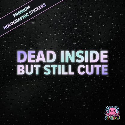 Premium holographic sticker with the phrase “DEAD INSIDE BUT STILL CUTE” in bold, pastel-shifting text on a black background with water droplets.