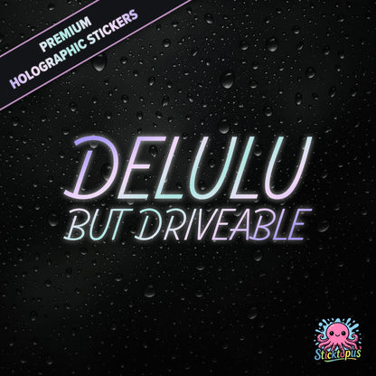 Premium holographic sticker with the phrase “DELULU BUT DRIVEABLE” in bold, pastel-shifting text on a black background with water droplets.