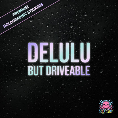 Premium holographic sticker with the phrase “DELULU BUT DRIVEABLE” in bold, pastel-shifting text on a black background with water droplets.