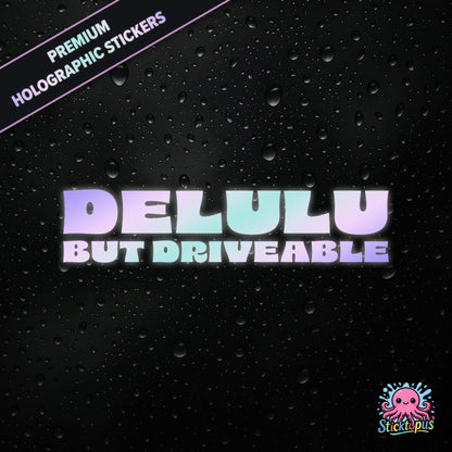 Premium holographic sticker with the phrase “DELULU BUT DRIVEABLE” in bold, pastel-shifting text on a black background with water droplets.