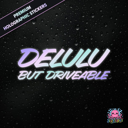Premium holographic sticker with the phrase “DELULU BUT DRIVEABLE” in bold, pastel-shifting text on a black background with water droplets.