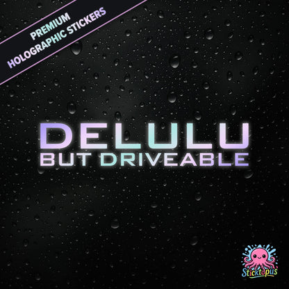 Premium holographic sticker with the phrase “DELULU BUT DRIVEABLE” in bold, pastel-shifting text on a black background with water droplets.