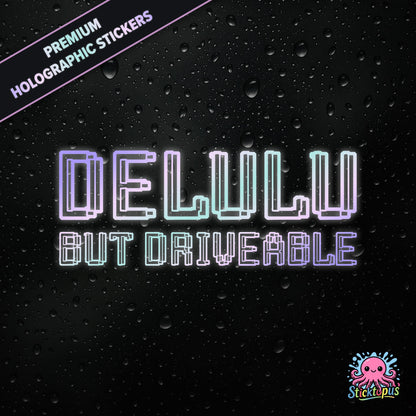 Premium holographic sticker with the phrase “DELULU BUT DRIVEABLE” in bold, pastel-shifting text on a black background with water droplets.