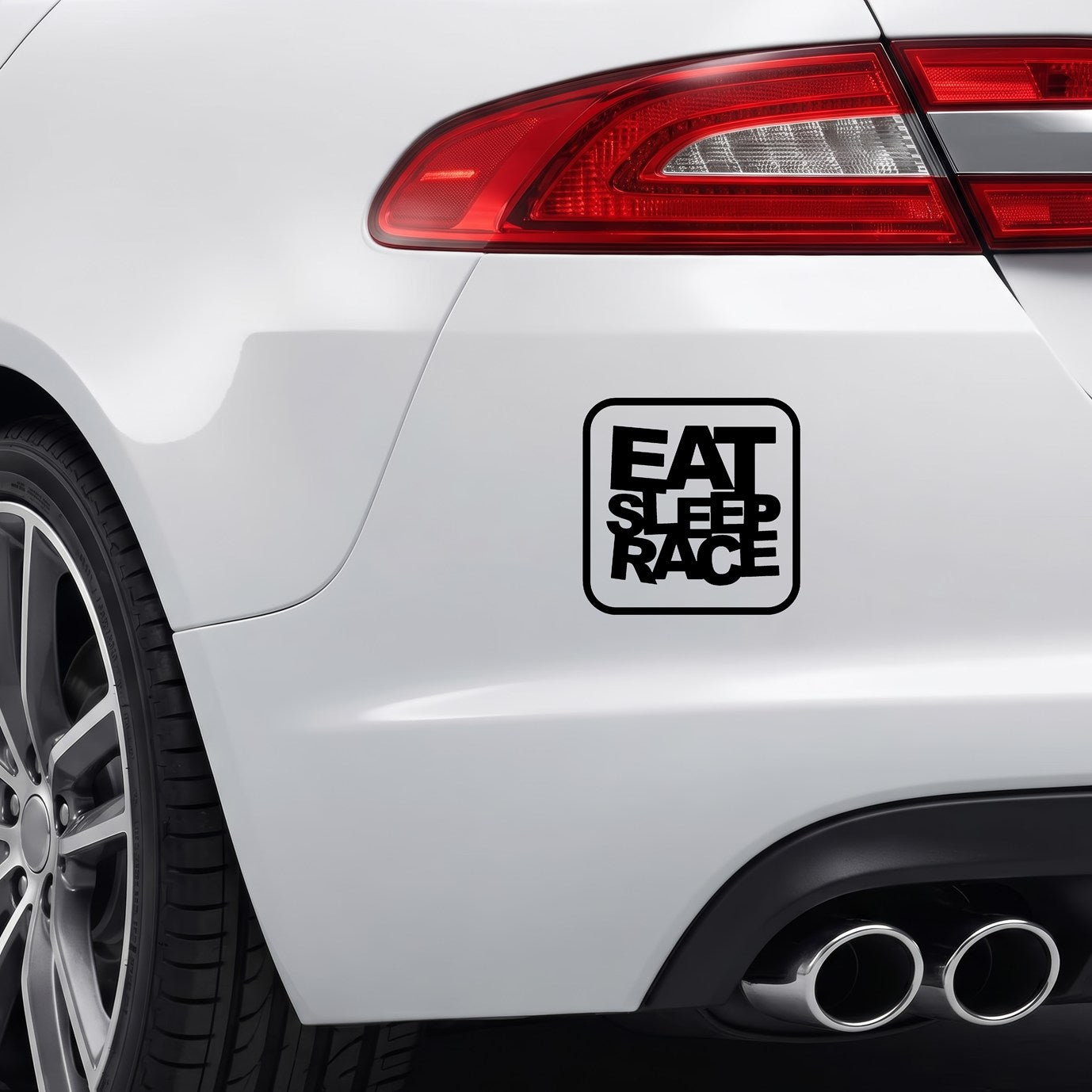 Black Eat Sleep Race vinyl sticker applied to a car bumper.