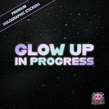 Premium holographic sticker with the phrase “Glow Up in Progress” in bold, pastel-shifting text on a black background with water droplets.