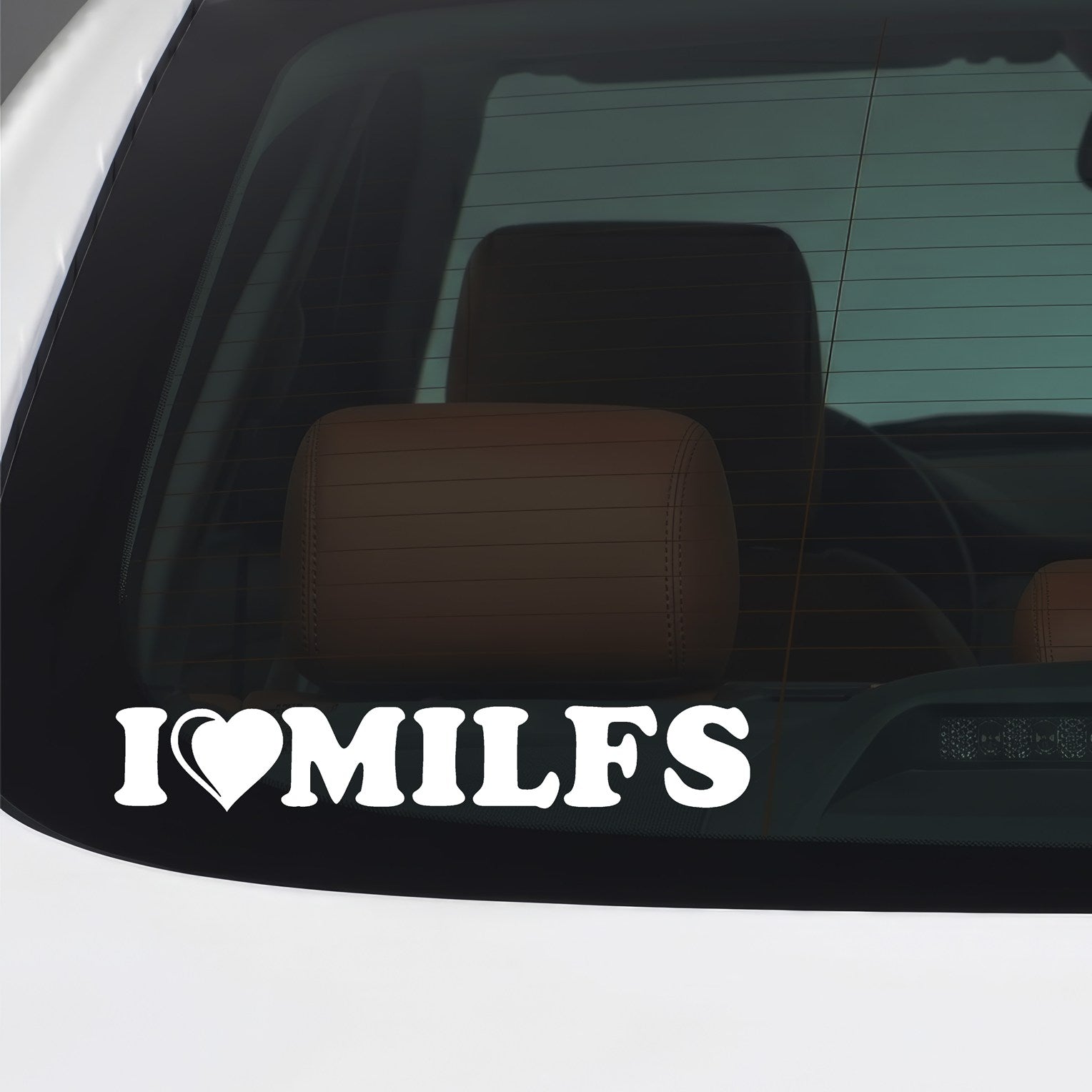White I Love MILFs vinyl sticker applied to a car window.