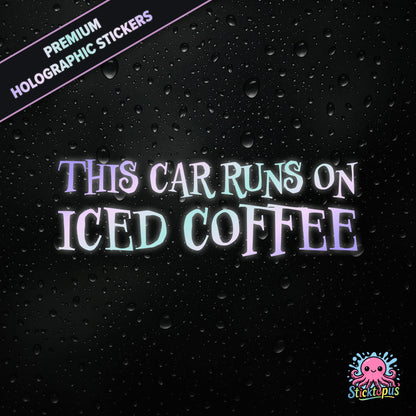 Premium holographic sticker with the phrase “THIS CAR RUNS ON ICED COFFEE” in bold, colour-shifting text on a black background with water droplets.