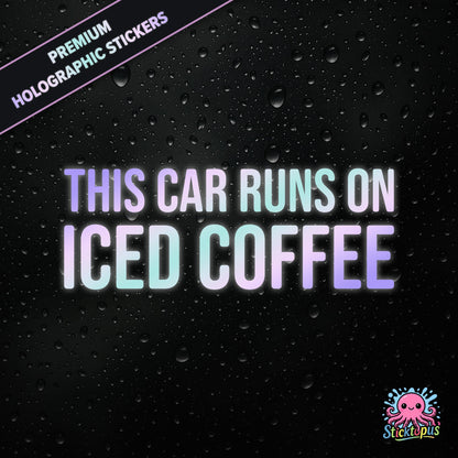 Premium holographic sticker with the phrase “THIS CAR RUNS ON ICED COFFEE” in bold, colour-shifting text on a black background with water droplets.