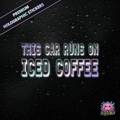 Premium holographic sticker with the phrase “THIS CAR RUNS ON ICED COFFEE” in bold, colour-shifting text on a black background with water droplets.