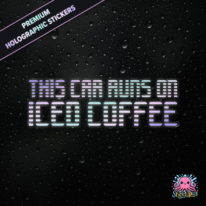 Premium holographic sticker with the phrase “THIS CAR RUNS ON ICED COFFEE” in bold, colour-shifting text on a black background with water droplets.