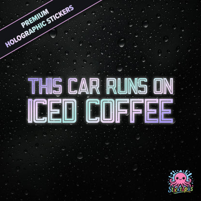 Premium holographic sticker with the phrase “THIS CAR RUNS ON ICED COFFEE” in bold, colour-shifting text on a black background with water droplets.