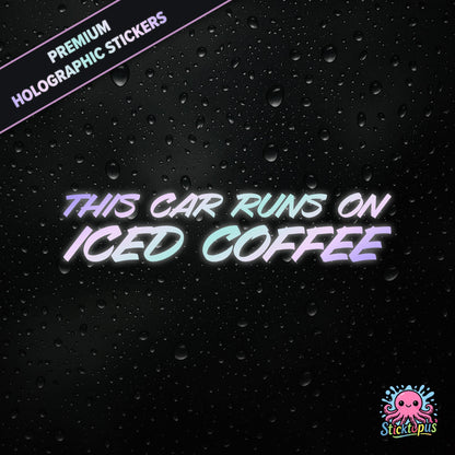 Premium holographic sticker with the phrase “THIS CAR RUNS ON ICED COFFEE” in bold, colour-shifting text on a black background with water droplets.