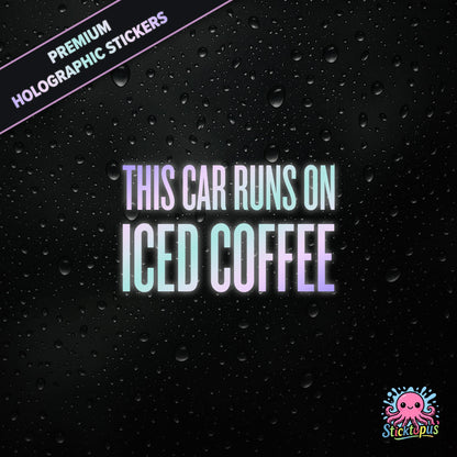 Premium holographic sticker with the phrase “THIS CAR RUNS ON ICED COFFEE” in bold, colour-shifting text on a black background with water droplets.