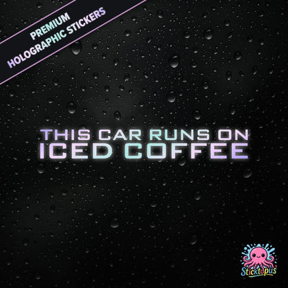 Premium holographic sticker with the phrase “THIS CAR RUNS ON ICED COFFEE” in bold, colour-shifting text on a black background with water droplets.
