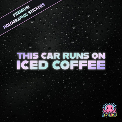 Premium holographic sticker with the phrase “THIS CAR RUNS ON ICED COFFEE” in bold, colour-shifting text on a black background with water droplets.