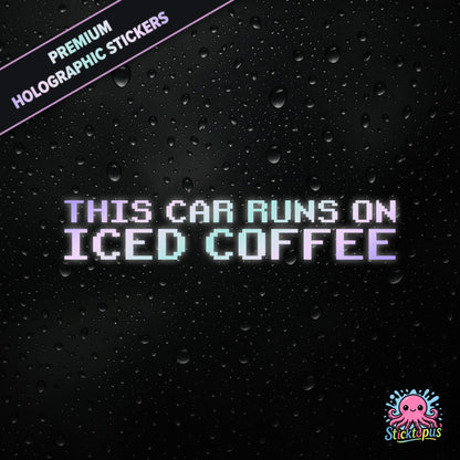 Premium holographic sticker with the phrase “THIS CAR RUNS ON ICED COFFEE” in bold, colour-shifting text on a black background with water droplets.