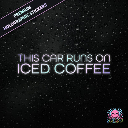 Premium holographic sticker with the phrase “THIS CAR RUNS ON ICED COFFEE” in bold, colour-shifting text on a black background with water droplets.