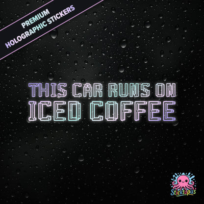 Premium holographic sticker with the phrase “THIS CAR RUNS ON ICED COFFEE” in bold, colour-shifting text on a black background with water droplets.