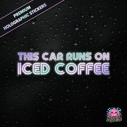 Premium holographic sticker with the phrase “THIS CAR RUNS ON ICED COFFEE” in bold, colour-shifting text on a black background with water droplets.