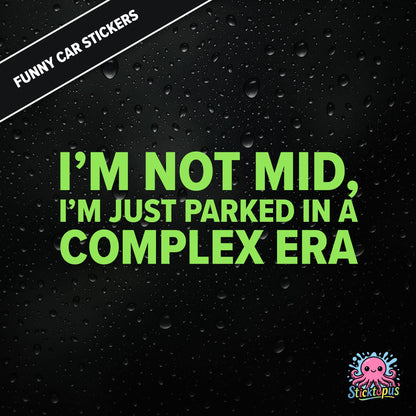 I’m Not Mid, I’m Just Parked In A Complex Era — absurd mid-era sticker in green text, surreal generational nonsense.