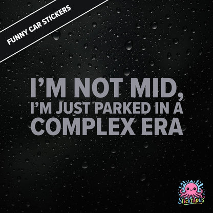 I’m Not Mid, I’m Just Parked In A Complex Era — absurd mid-era sticker in silver text, surreal generational nonsense.