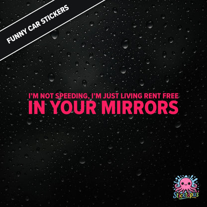 I’m Not Speeding, I’m Just Living Rent Free In Your Mirrors — passive-aggressive speeding sticker in pink text, surreal mirror logic.