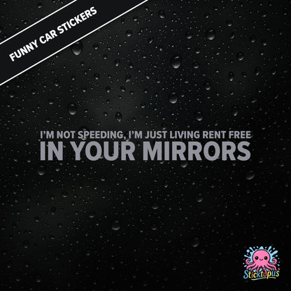 I’m Not Speeding, I’m Just Living Rent Free In Your Mirrors — passive-aggressive speeding sticker in silver text, surreal mirror logic.