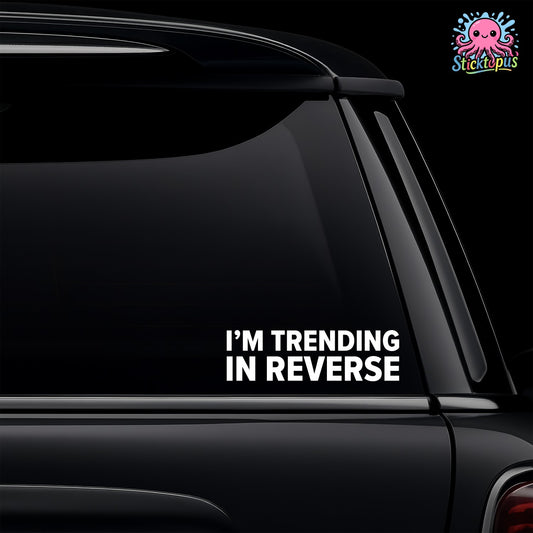 Black car with 'I'm Trending in Reverse' decal and Sticktopus logo.