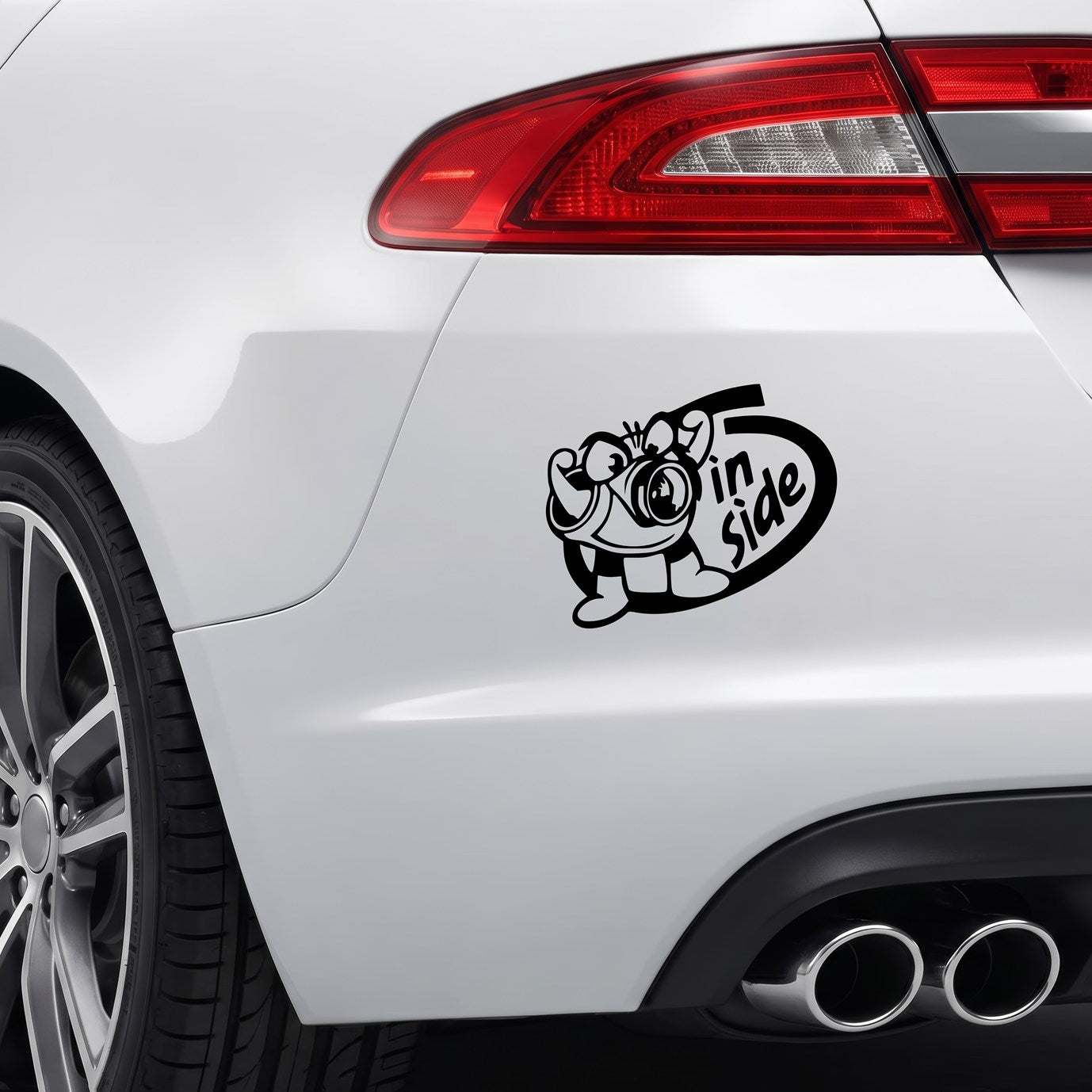 Black Turbo Inside vinyl sticker applied to a car rear bumper.