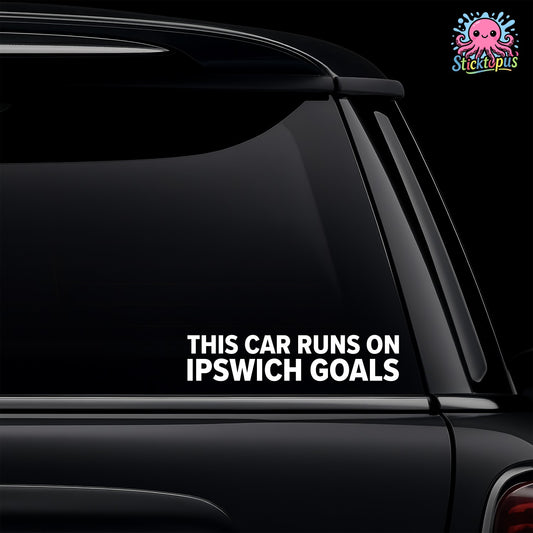 Car window with 'This Car Runs On Ipswich Goals' decal.